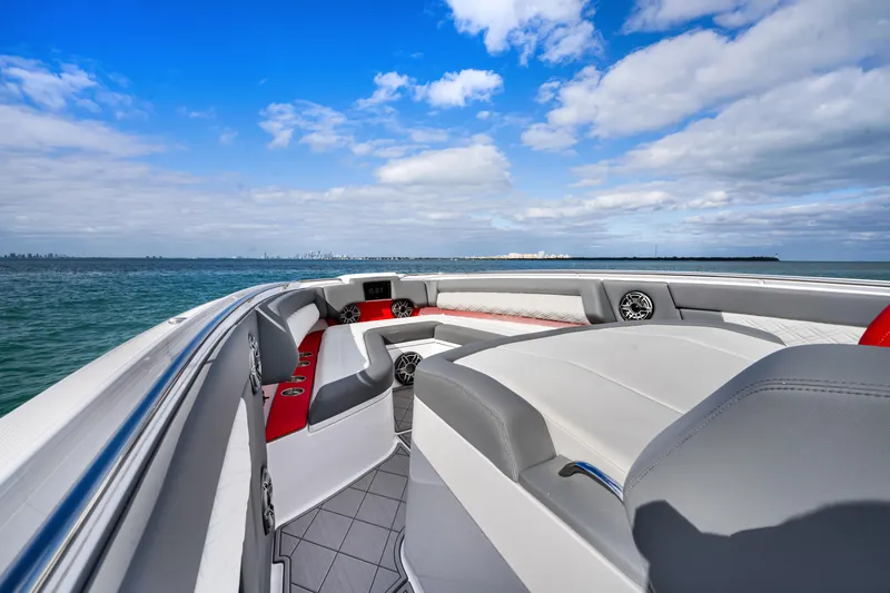 Slide: The Image of 2022 Cigarette 42 Auroris boat interior with luxurious seating and ocean view. - 12