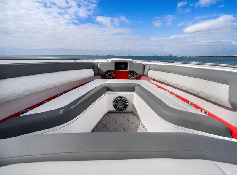 Slide: The Image of 2022 Cigarette 42 Auroris luxury boat with sleek seating and modern design on a calm lake. - 16