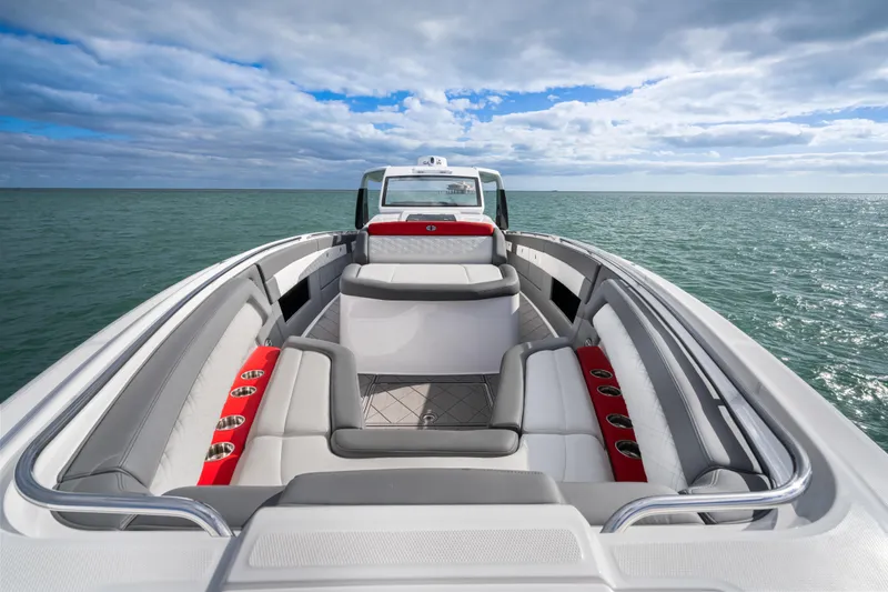 Slide: The Image of 2022 Cigarette 42 Auroris boat interior with luxurious seating on open water. - 17