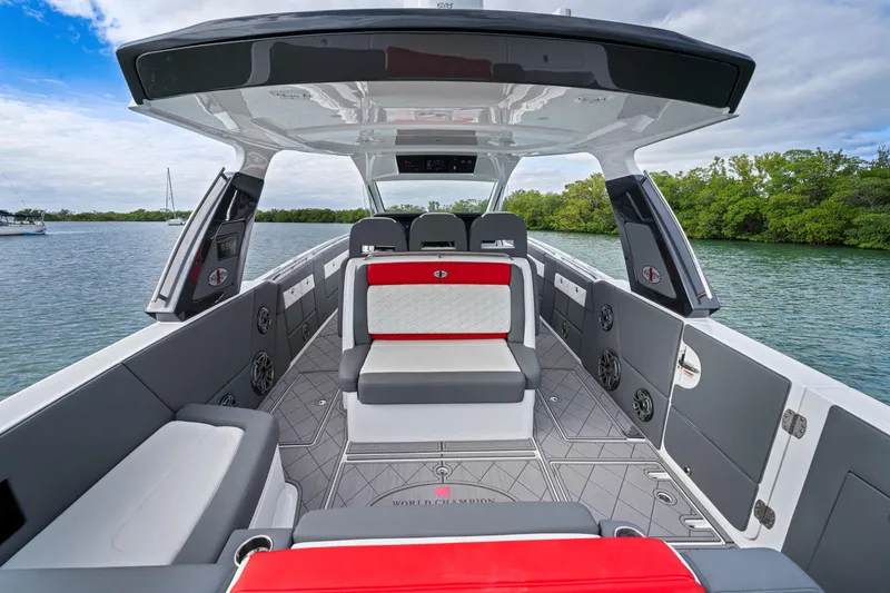 Slide: The Image of 2022 Cigarette 42 Auroris boat interior with modern seating and sleek design on the water. - 21