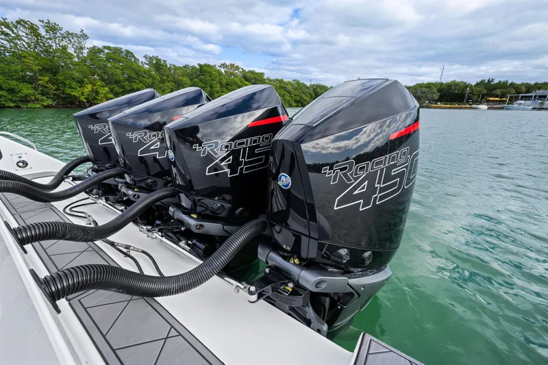Slide: The Image of Four powerful outboard engines on a 2022 Cigarette 42 Auroris boat. - 23