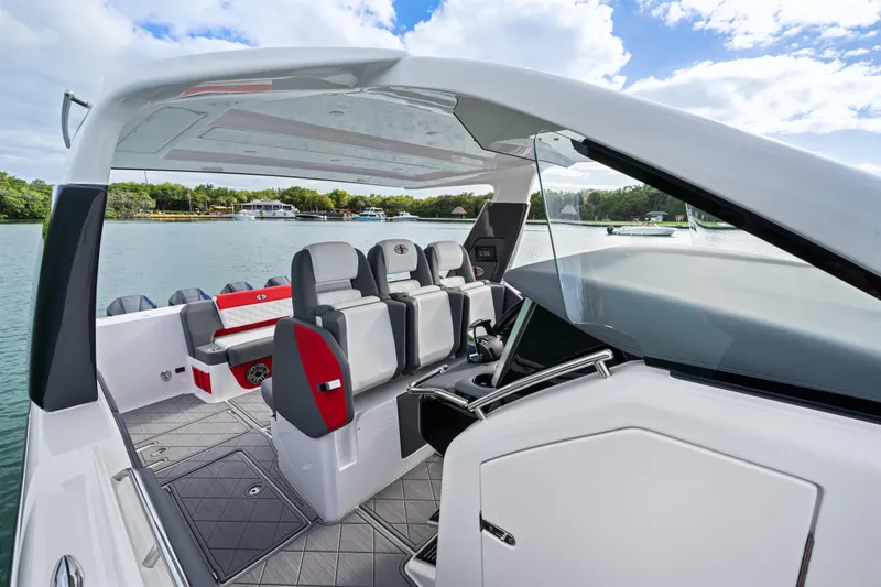 Slide: The Image of 2022 Cigarette 42 Auroris luxury boat interior with modern seating and sleek design. - 24