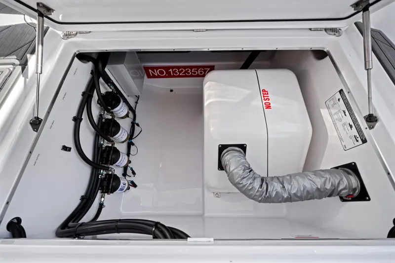 Slide: The Image of Engine compartment of 2022 Cigarette 42 Auroris boat, showcasing mechanical components. - 25