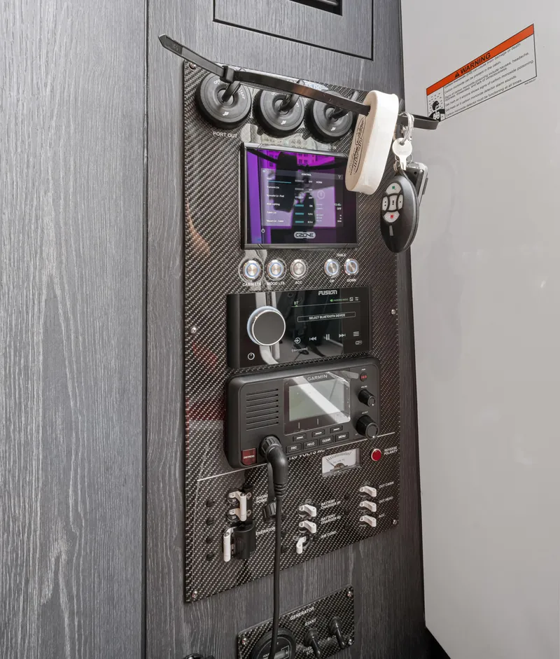 Slide: The Image of Control panel of 2022 Cigarette 42 Auroris boat with advanced navigation and communication systems. - 29