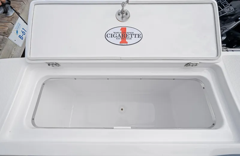 Slide: The Image of Open storage compartment on 2022 Cigarette 42 Auroris boat. - 36