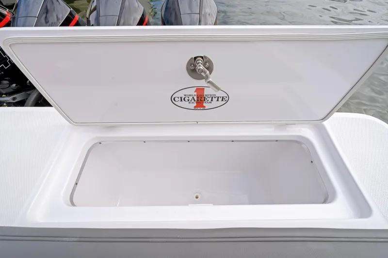 Slide: The Image of Open storage compartment on 2022 Cigarette 42 Auroris boat. - 37