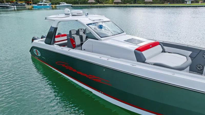 Slide: The Image of 2022 Cigarette 42 Auroris boat on calm water, featuring sleek design and modern amenities. - 8