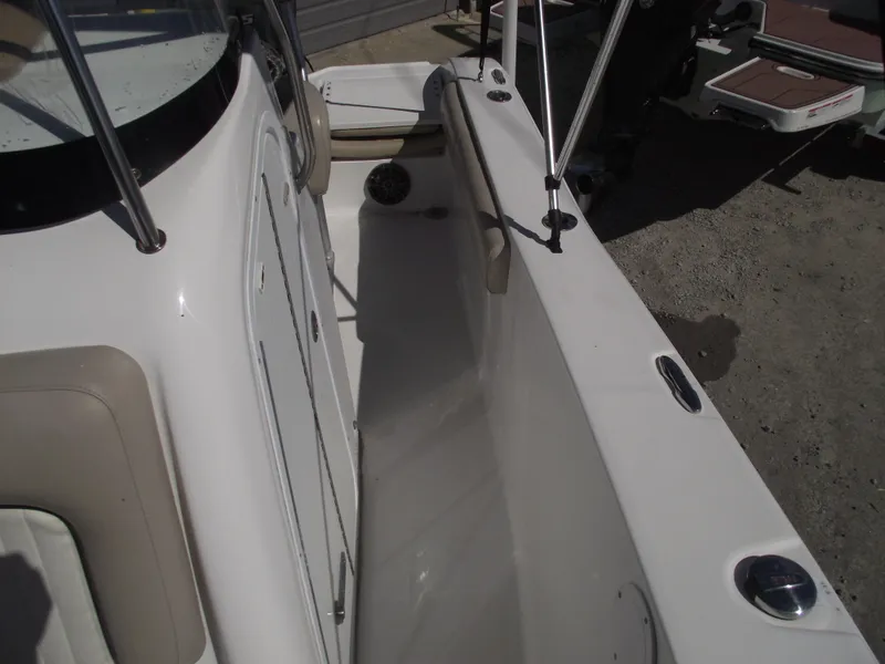 Slide: The Image of 2016 Sea Fox 186 Commander boat interior with seating and storage compartments. - 16