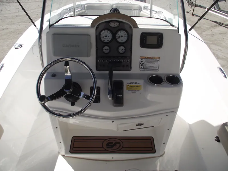 Slide: The Image of 2016 Sea Fox 186 Commander boat console with steering wheel and gauges. - 19