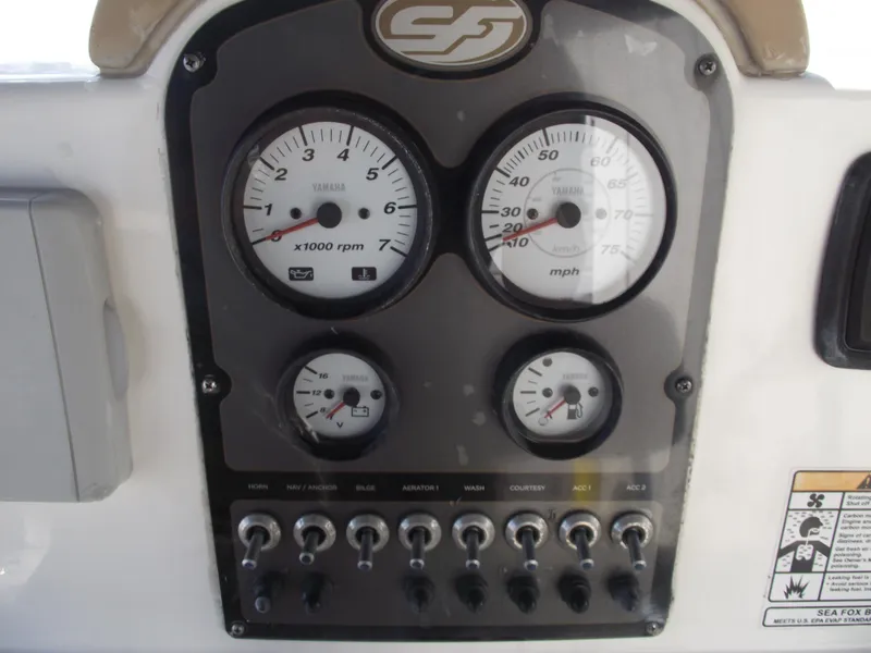 Slide: The Image of Dashboard of 2016 Sea Fox 186 Commander boat with gauges and switches. - 20