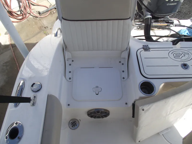 Slide: The Image of 2016 Sea Fox 186 Commander boat interior with seating and storage compartments. - 26