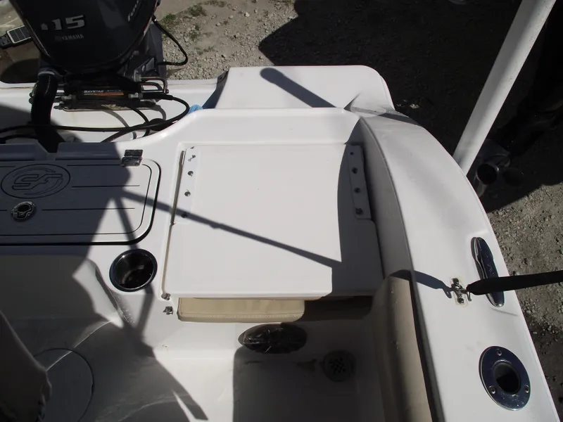 Slide: The Image of 2016 Sea Fox 186 Commander boat interior with storage compartment and Yamaha engine. - 28