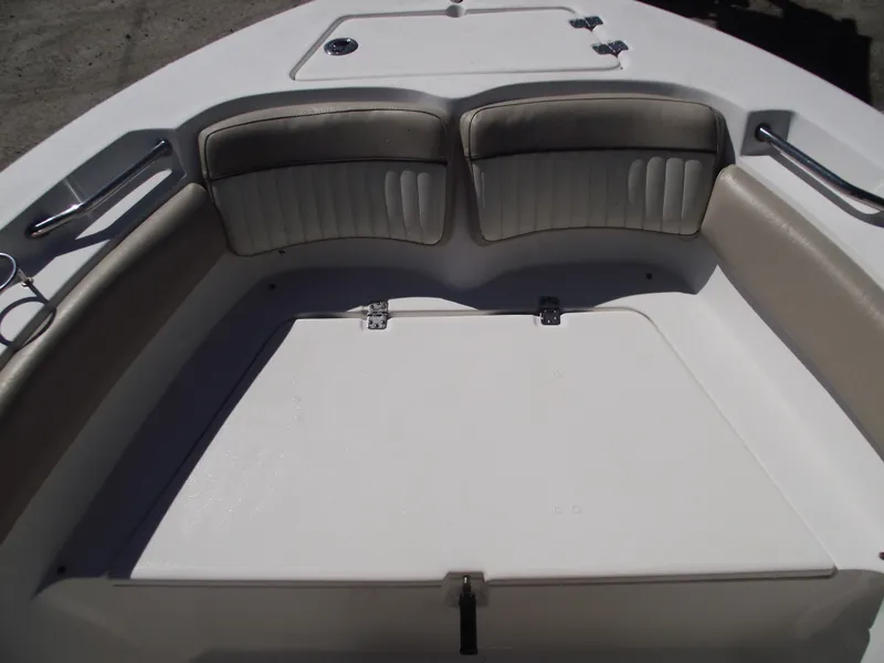Slide: The Image of 2016 Sea Fox 186 Commander boat interior with cushioned seating and storage. - 8