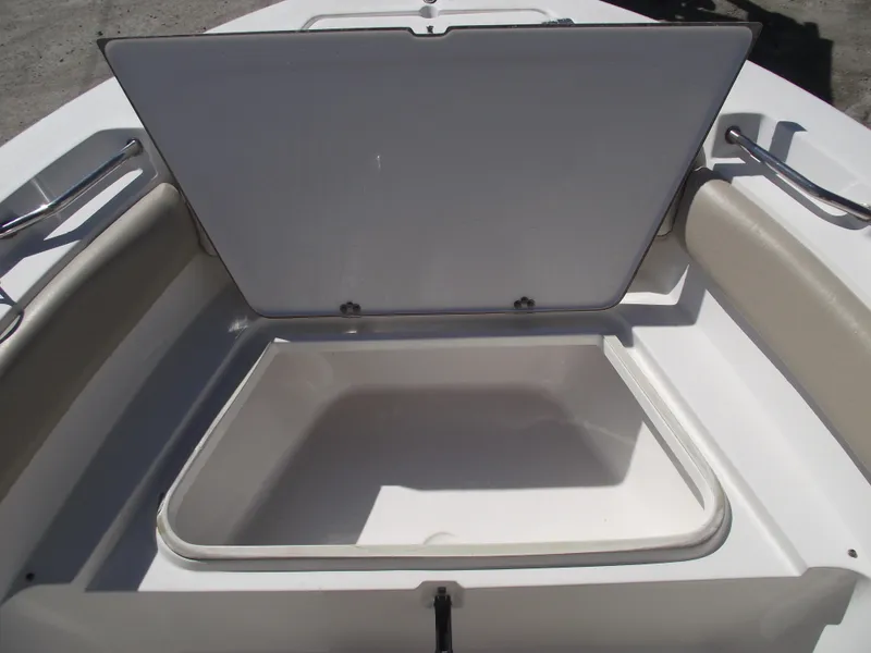 Slide: The Image of 2016 Sea Fox 186 Commander boat storage compartment open, showcasing interior space. - 9