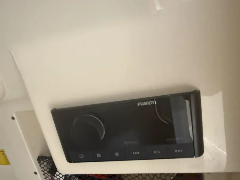 Slide: The Image of Fusion audio control panel on 2022 Scout 255 LXF boat. - 13