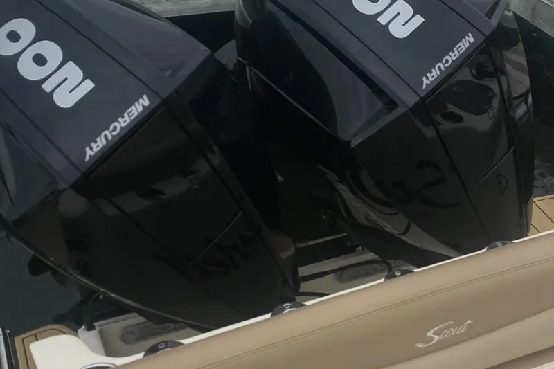 Slide: The Image of 2022 Scout 255 LXF boat with dual Mercury outboard engines. - 28