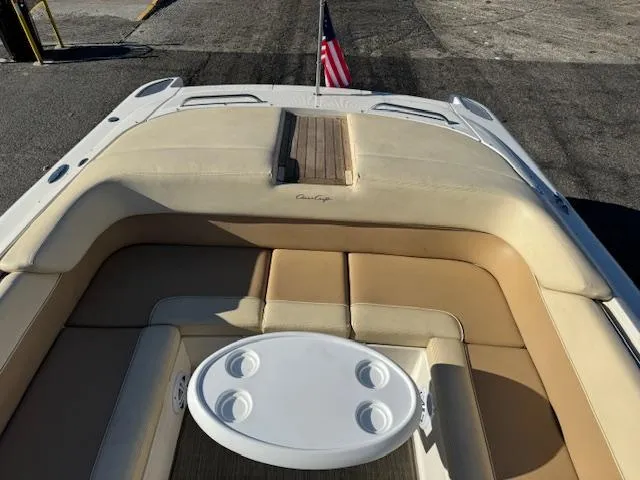 Slide: The Image of 2007 Chris-Craft Corsair 28 boat with beige interior and table. - 12