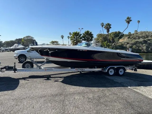 Slide: The Image of 2007 Chris-Craft Corsair 28 boat on trailer outdoors. - 20