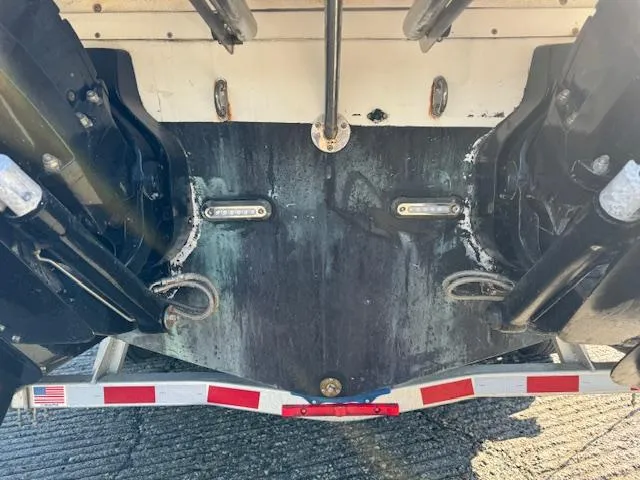 Slide: The Image of Rear view of a 2007 Chris-Craft Corsair 28 boat on a trailer. - 24