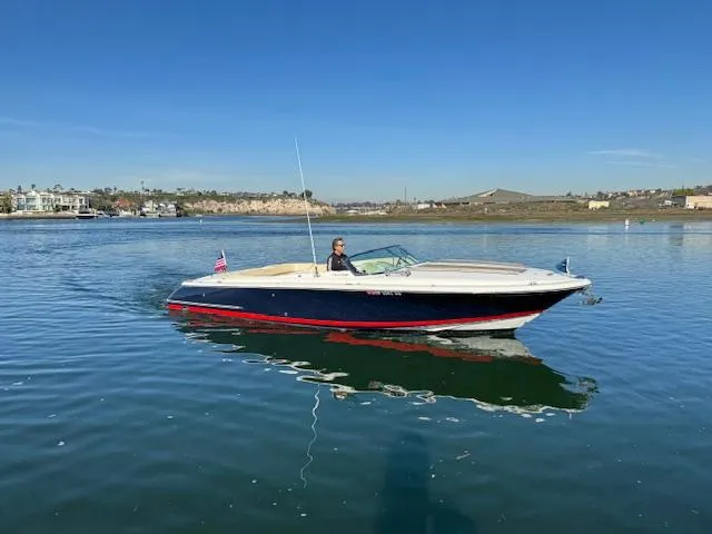 Slide: The Image of 2007 Chris-Craft Corsair 28 on calm water. - 4