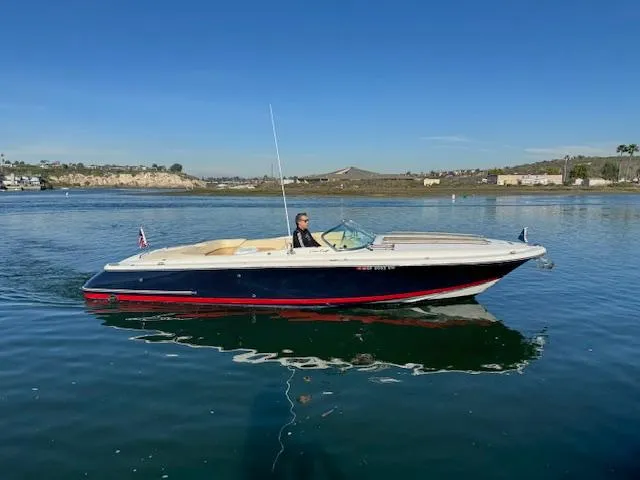 Slide: The Image of 2007 Chris-Craft Corsair 28 on calm water. - 5