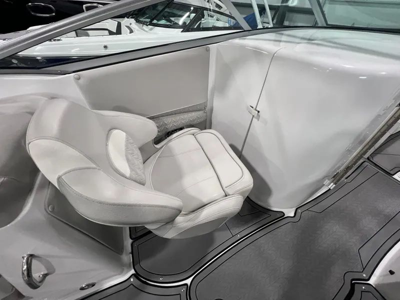 Slide: The Image of 2021 Hurricane SunDeck 2690 OB boat interior with gray and white seating. - 10