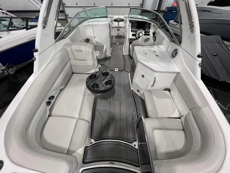 Slide: The Image of 2021 Hurricane SunDeck 2690 OB boat interior with spacious seating and modern design. - 3