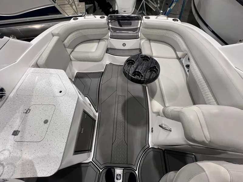 Slide: The Image of 2021 Hurricane SunDeck 2690 OB interior with sleek seating and modern design. - 7