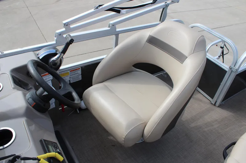 Slide: The Image of 2022 Sun Tracker Party Barge 18 DLX captain's chair and steering wheel. - 15