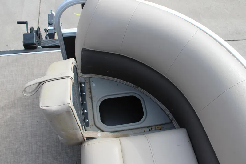 Slide: The Image of 2022 Sun Tracker Party Barge 18 DLX boat seating with storage compartment. - 19