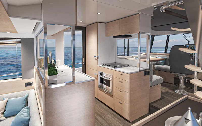 Slide: The Image of Luxurious interior of 2026 Beneteau Swift Trawler 54 with modern kitchen and ocean view. - 10