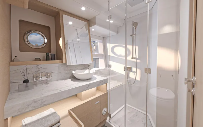 Slide: The Image of Luxurious bathroom in 2026 Beneteau Swift Trawler 54 with modern fixtures and elegant design. - 14