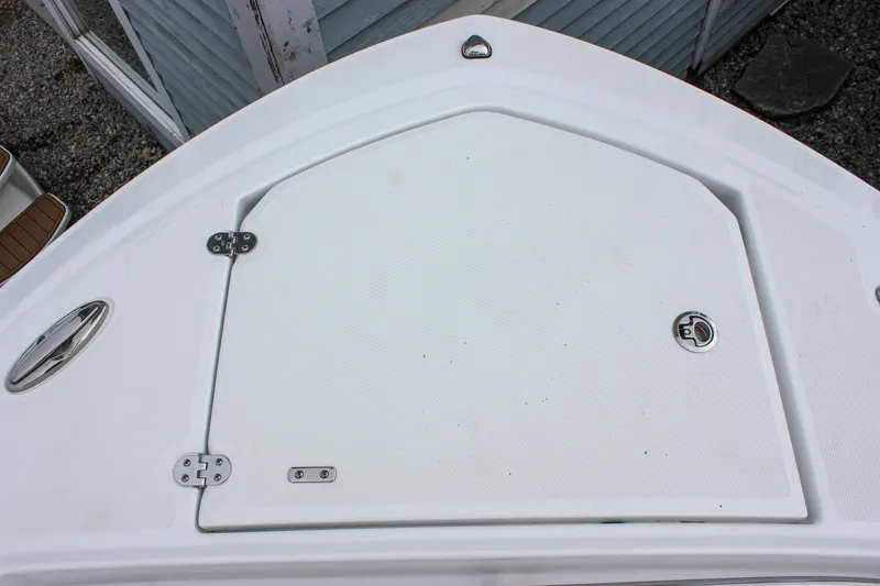 Slide: The Image of 2023 Blackfin 252 CC boat deck with storage hatch and stainless steel fittings. - 28