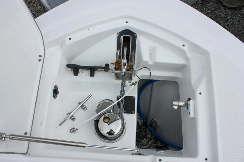 Slide: The Image of 2023 Blackfin 252 CC anchor locker with winch and rope storage. - 29