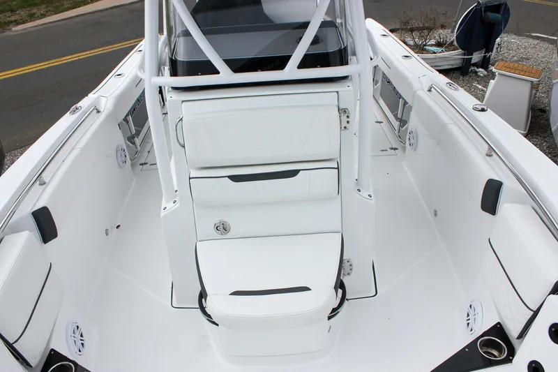 Slide: The Image of 2023 Blackfin 252 CC boat interior with white seating and center console. - 30