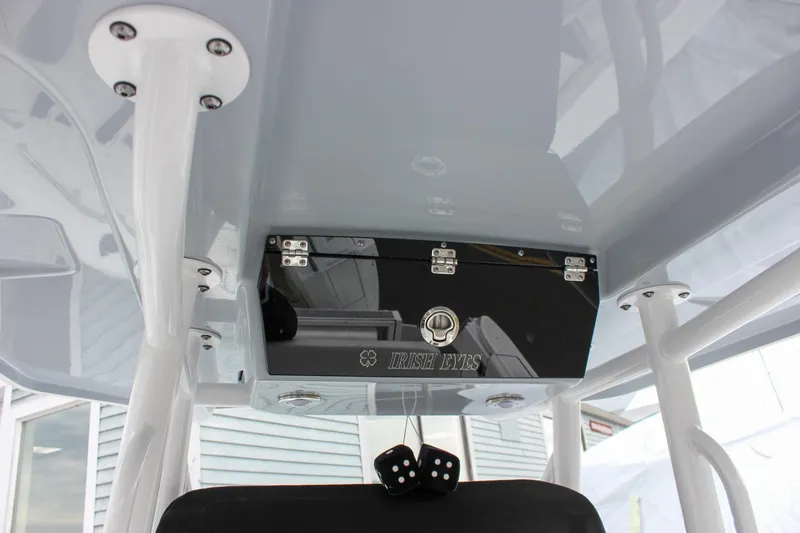 Slide: The Image of 2023 Blackfin 252 CC boat console with storage compartment and sleek design. - 41