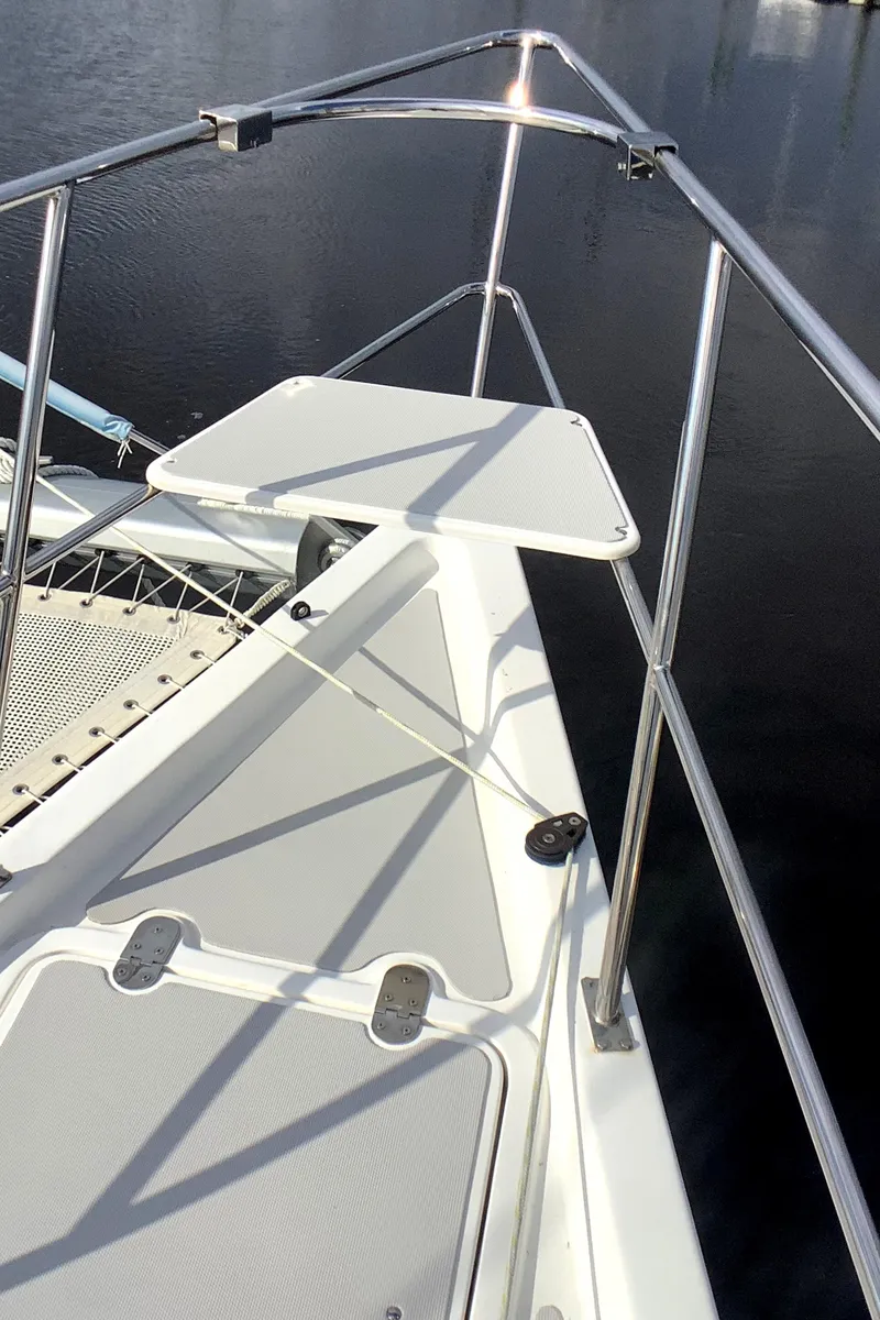Slide: The Image of 2021 Royal Cape Catamarans Majestic 570 Flybridge deck with stainless steel railings. - 14
