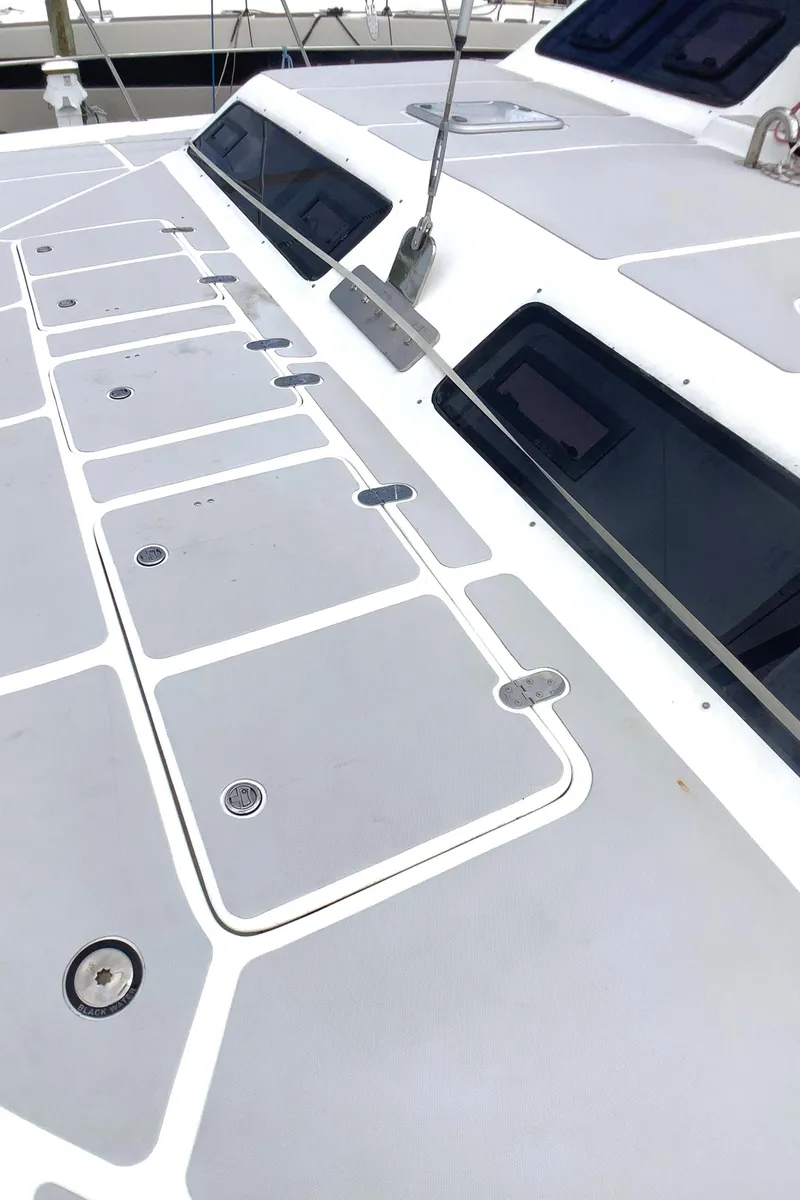 Slide: The Image of 2021 Royal Cape Catamarans Majestic 570 Flybridge deck with sleek design and modern features. - 19