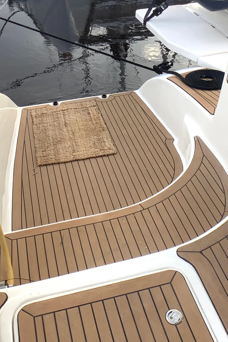 Slide: The Image of Teak deck of 2021 Royal Cape Catamarans Majestic 570 Flybridge yacht. - 34