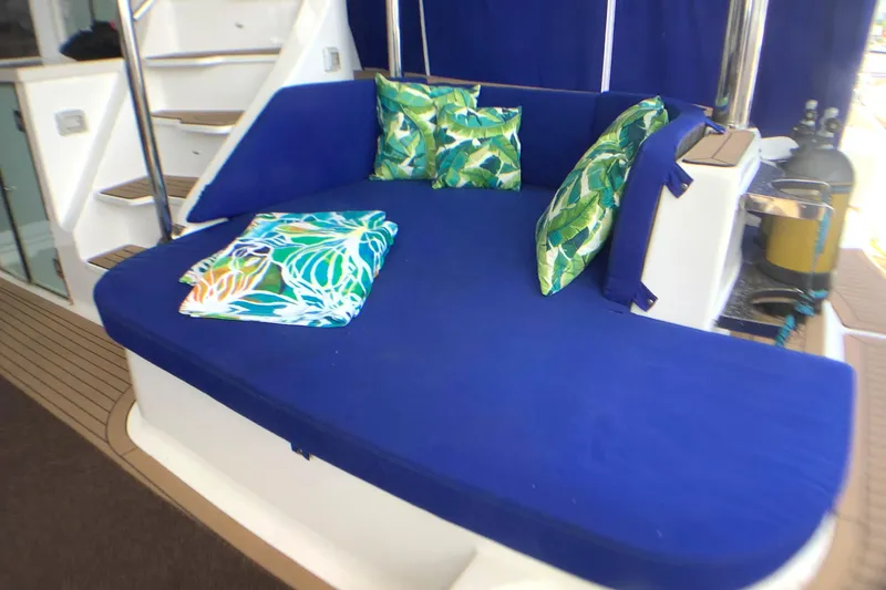 Slide: The Image of Luxurious seating area on 2021 Royal Cape Catamarans Majestic 570 Flybridge with vibrant cushions. - 46