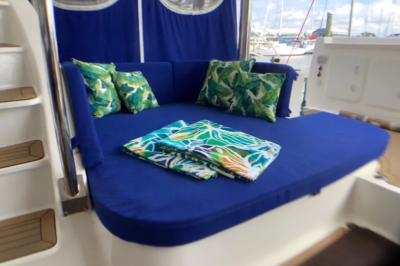 Slide: The Image of Luxurious seating area on 2021 Royal Cape Catamarans Majestic 570 Flybridge with vibrant cushions. - 47