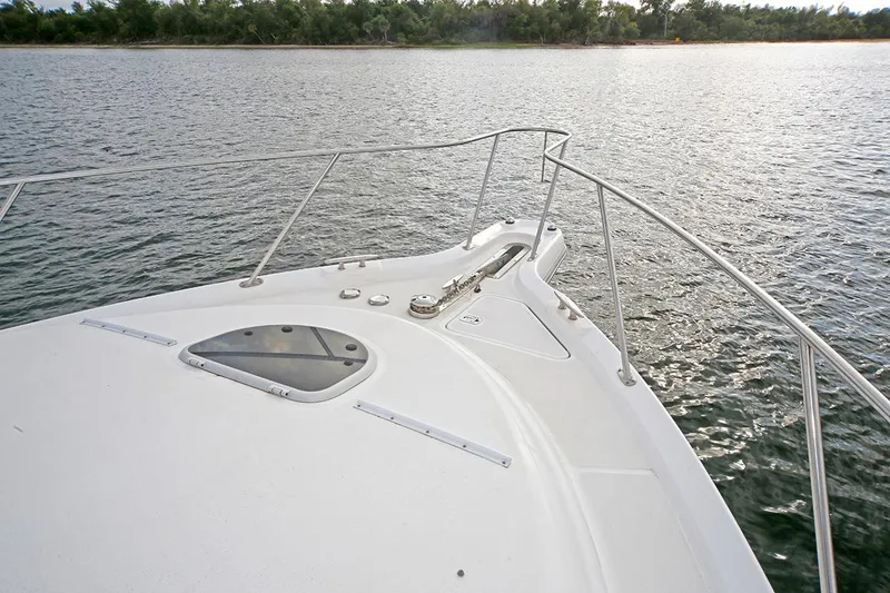 Slide: The Image of 2007 Tiara Yachts 3900 Sovran bow view on calm water. - 12