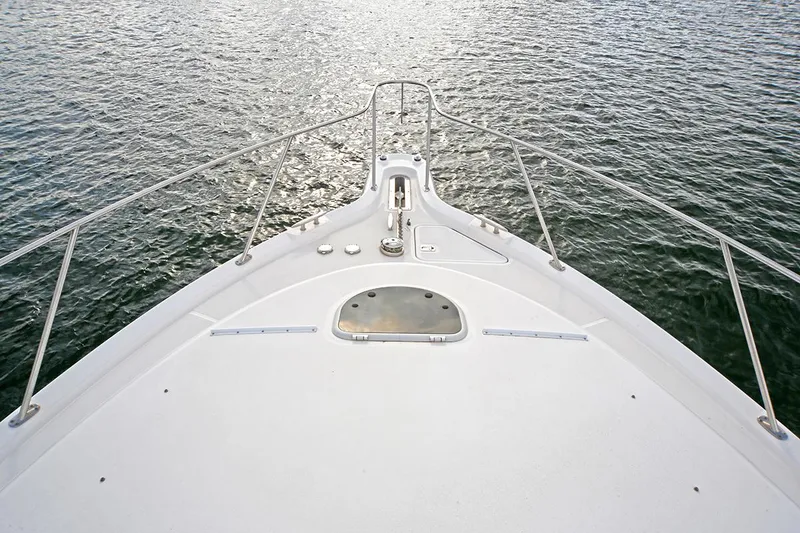 Slide: The Image of Bow view of 2007 Tiara Yachts 3900 Sovran on calm water. - 18