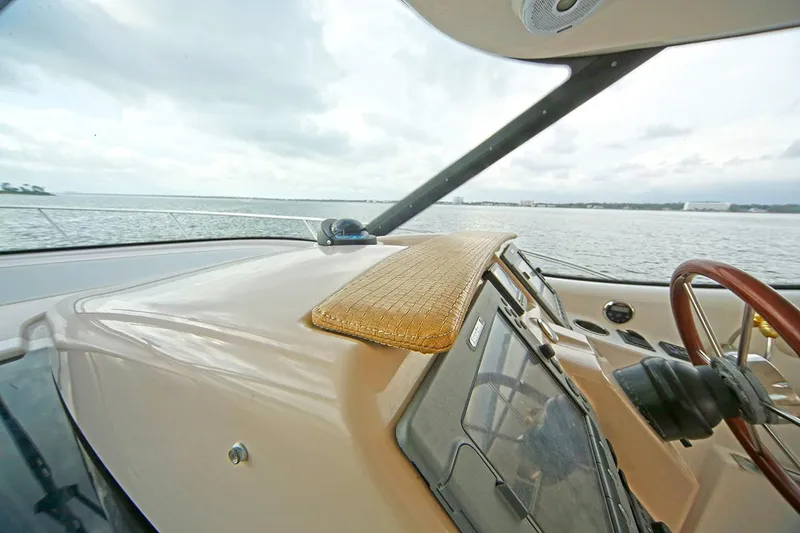 Slide: The Image of 2007 Tiara Yachts 3900 Sovran helm view with ocean backdrop. - 26