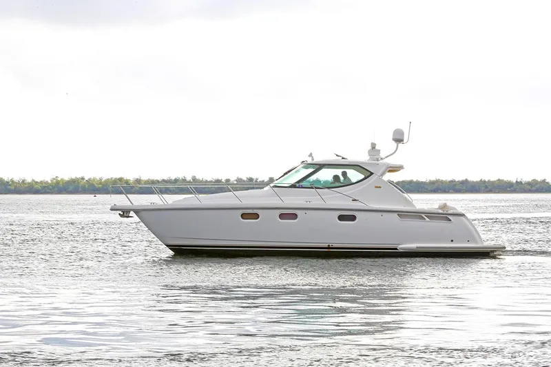 Slide: The Image of 2007 Tiara Yachts 3900 Sovran cruising on calm waters. - 3