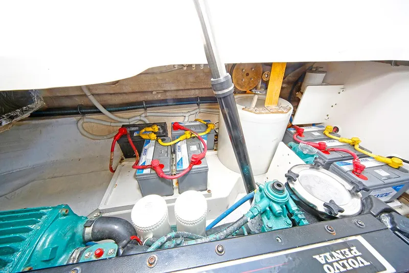 Slide: The Image of Engine compartment of 2007 Tiara Yachts 3900 Sovran with Volvo Penta components and batteries. - 41