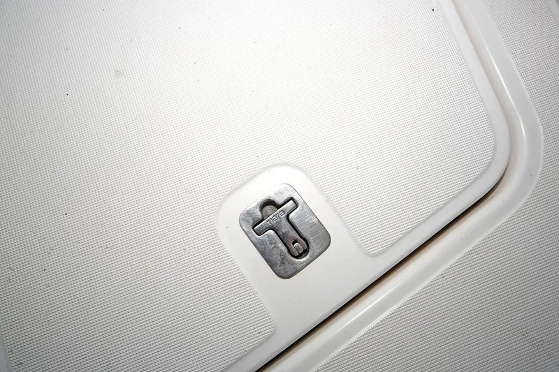 Slide: The Image of 2007 Tiara Yachts 3900 Sovran deck detail with metal latch. - 8