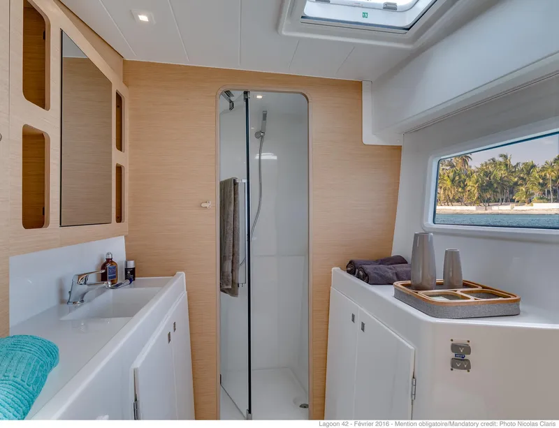 Slide: The Image of Luxurious bathroom interior of 2025 Lagoon 42 Millenium yacht with modern amenities. - 14