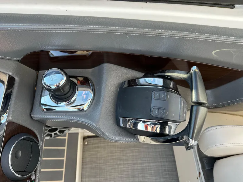 Slide: The Image of 2016 Chaparral 337SSX boat controls with joystick and throttle lever. - 36