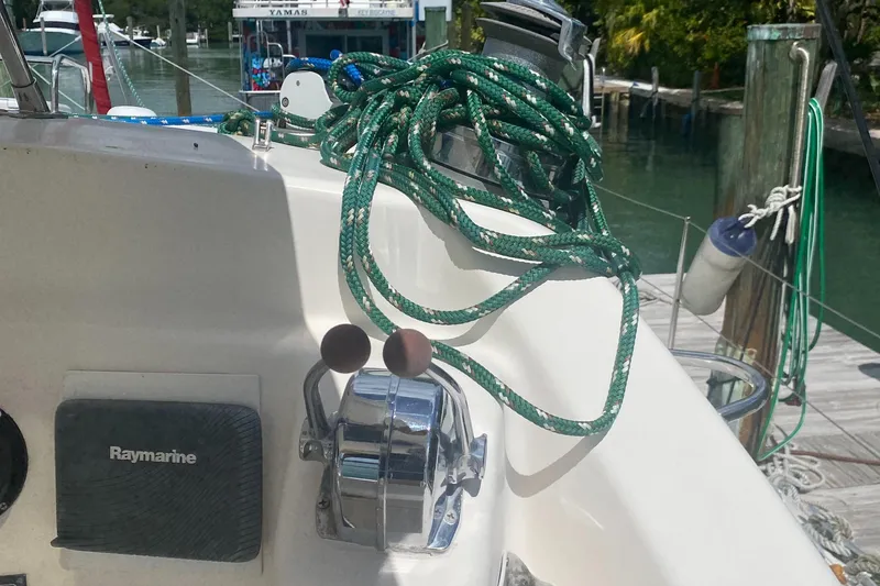 Slide: The Image of Leopard 38 sailboat cockpit with ropes and Raymarine equipment, docked in a marina. - 20